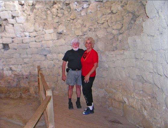 Carolyn Pararas-Carayannis & George Pararas-Carayannis inside upper level Mycenaean royal burial chamber at Poros -  Kefalonia, Greece; photo by Carolyn Pararas-Carayannis (c)